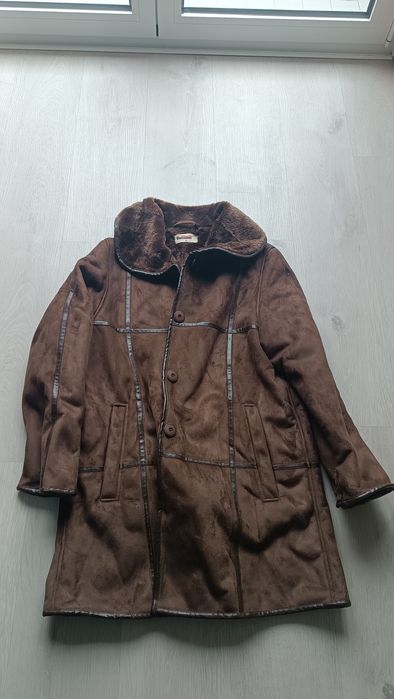 Casaco em pele castanho