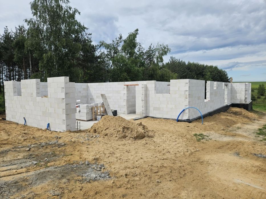 Budowa domów. Usługi budowlane . Usługi murarskie