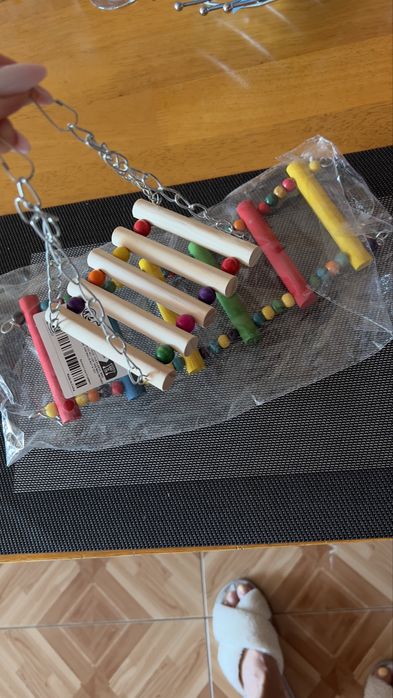 Качеля в клітку доя папуги