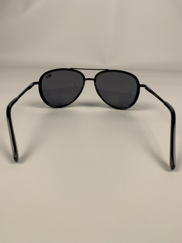 Солнцезащитные очки Lacoste