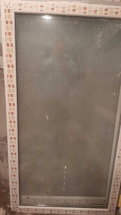 Балконний блок  -двері та  голухе  вікно