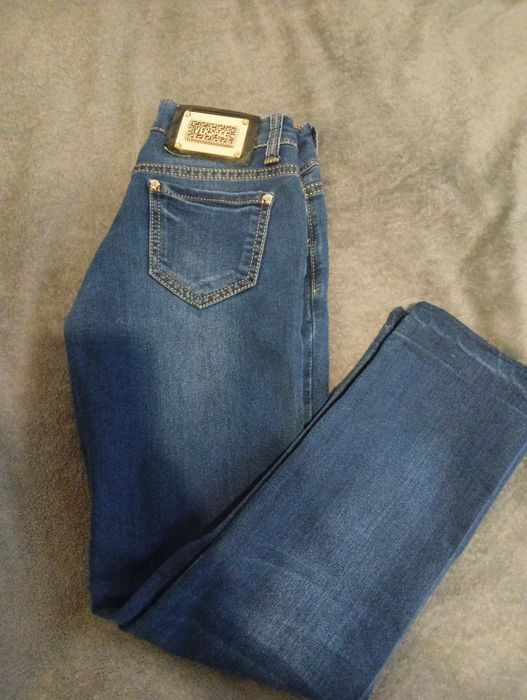 Spodnie jeansowe damskie Versace