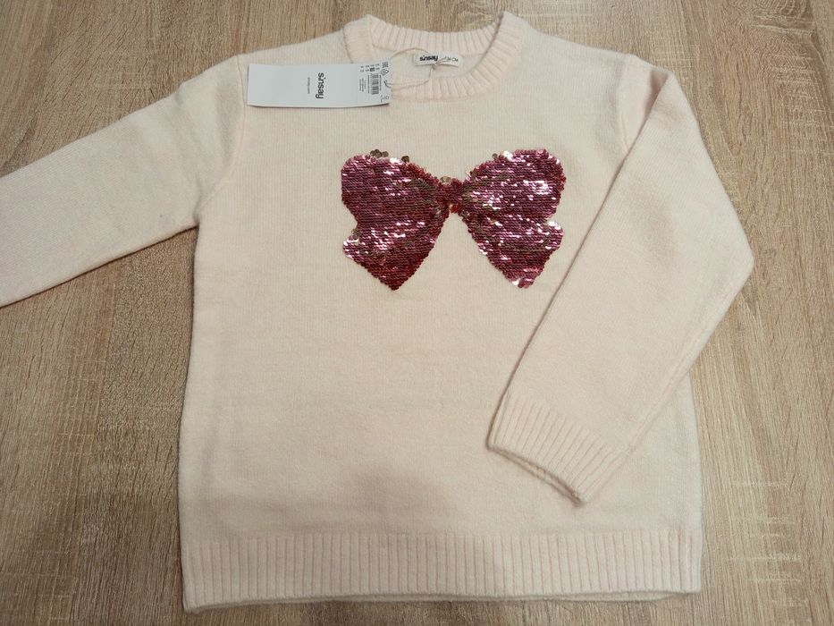 Nowy sweter dziewczęcy Sinsay r. 134 cekiny świąteczny