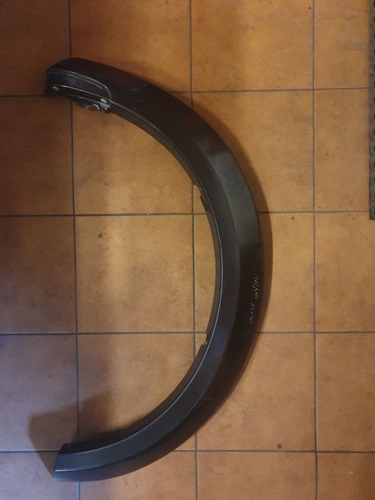 NAKŁADKA BŁOTNIKA PRAWY PRZÓD MITSUBISHI PAJERO SPORT 99-06 KOD A75