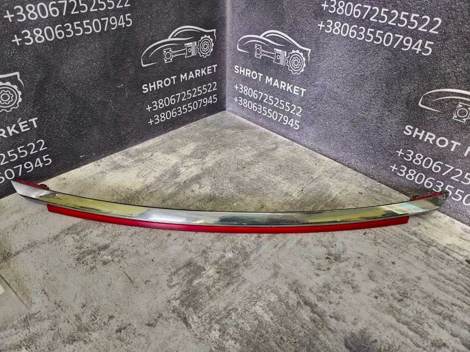 Планка відбивач катафот накладка зад кришки Kia Sportage QL 87310F11