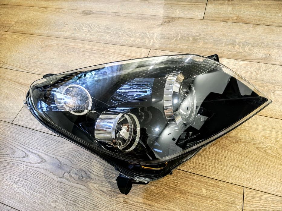 Reflektor lampa przód prawa opel astra h 3 III bixenon skrętny eu