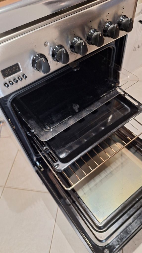 Kuchnia gazowo-elektryczna Hotpoint-Ariston C 35S P6 (X) stan wzorowy