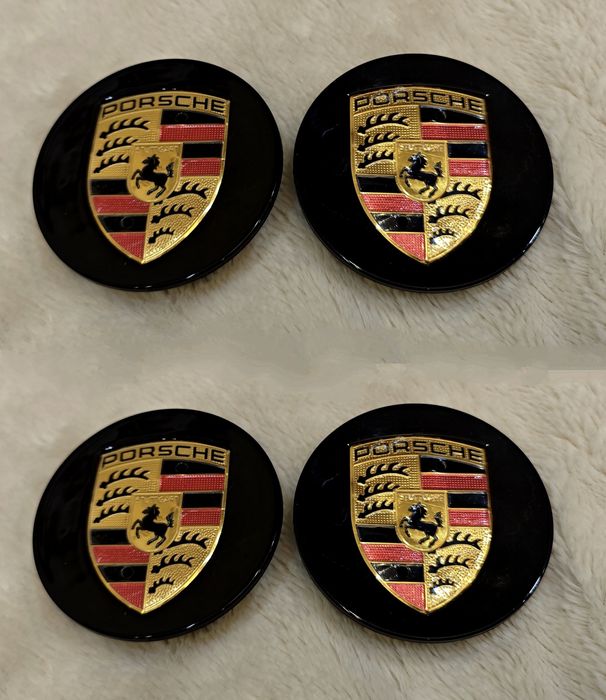 Заглушка кругленька з металлевой эмблемой