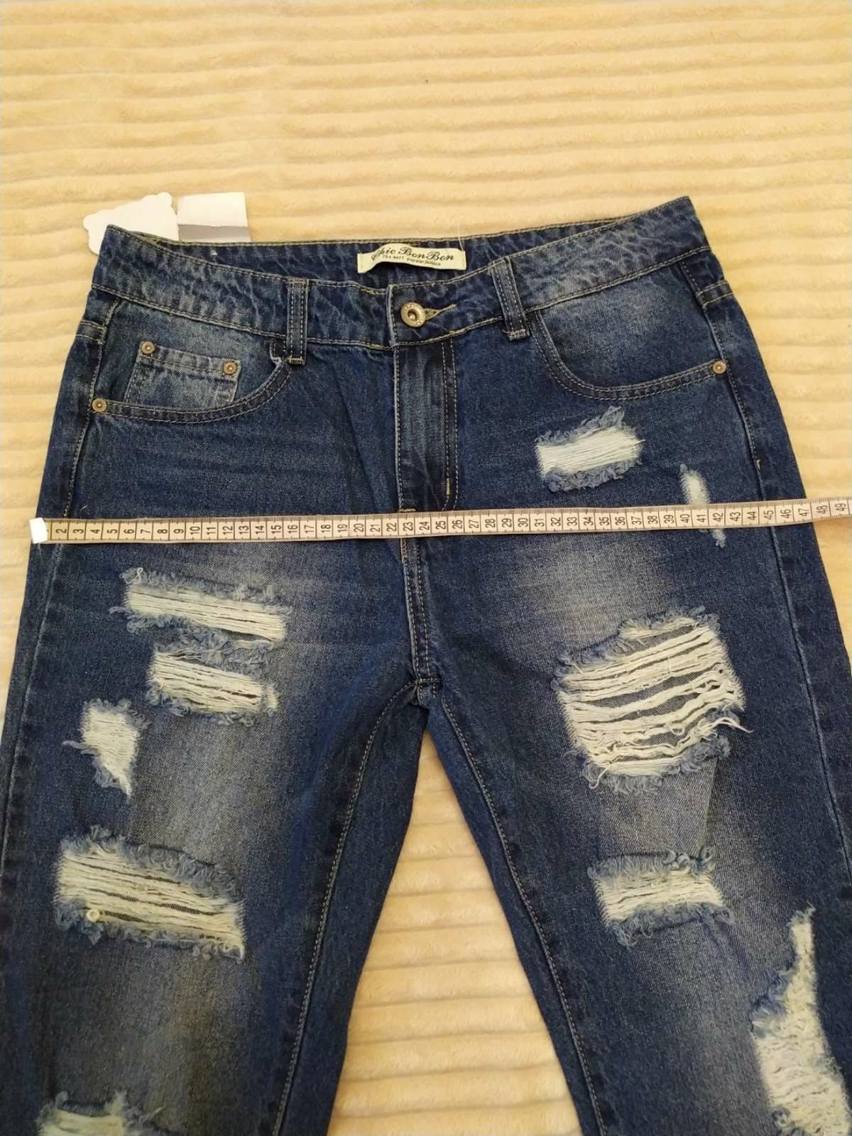 Рваные джинсы новые