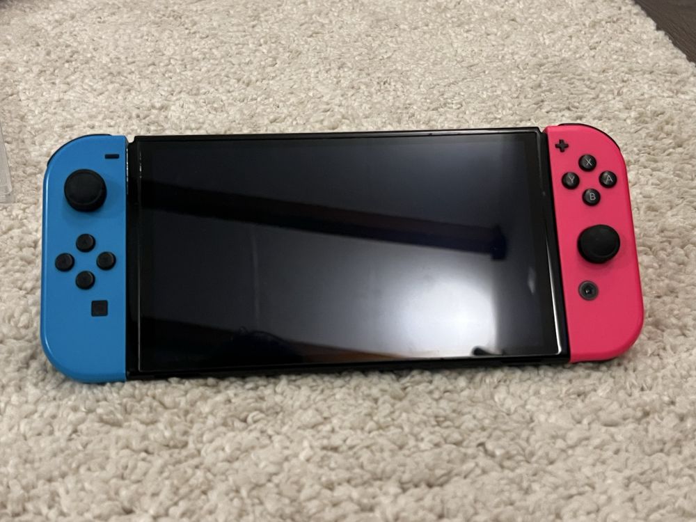 Nintendo Switch OLED + FIFA 23 + vários acessórios