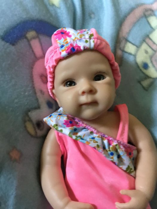 Boneca bebé reborn,verdadeiro silicone (artigos novos)