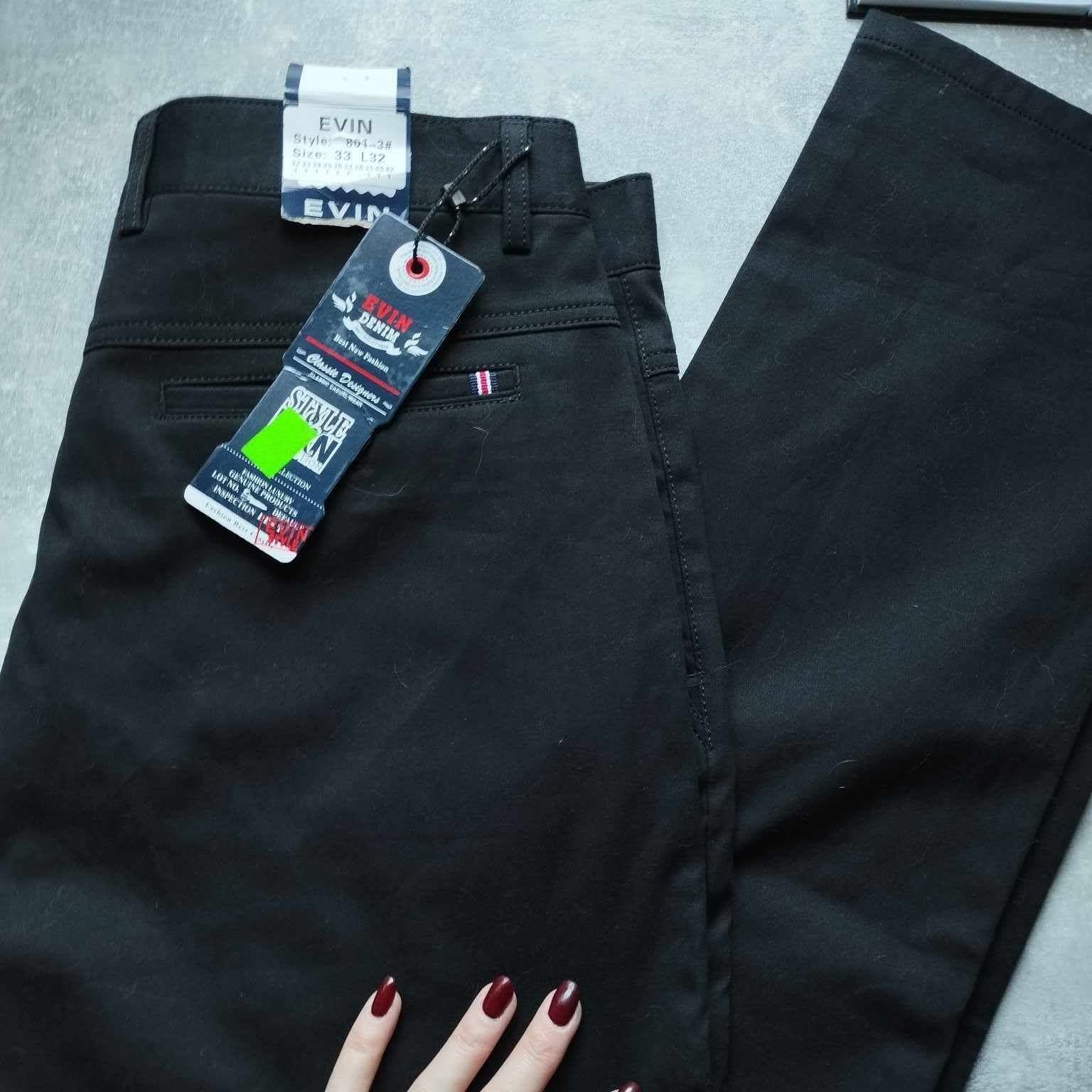 Nowe czarne bawełniane spodnie 33