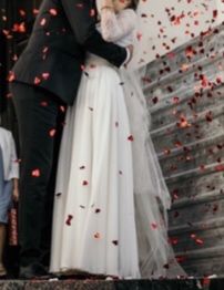 Suknia ślubna plus dwa welony