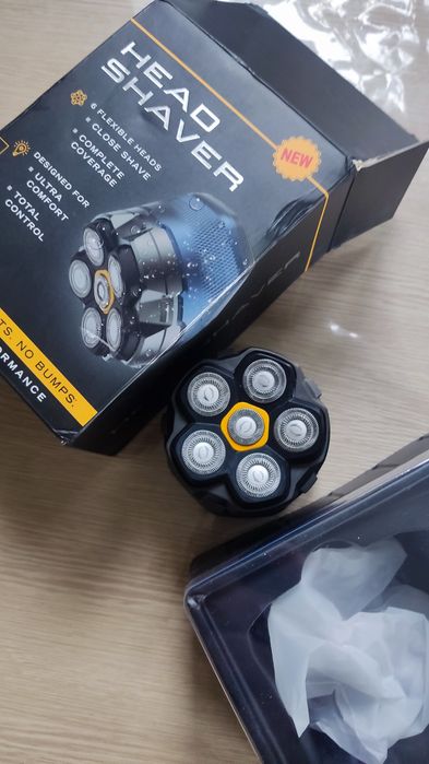 Електробритва для голови