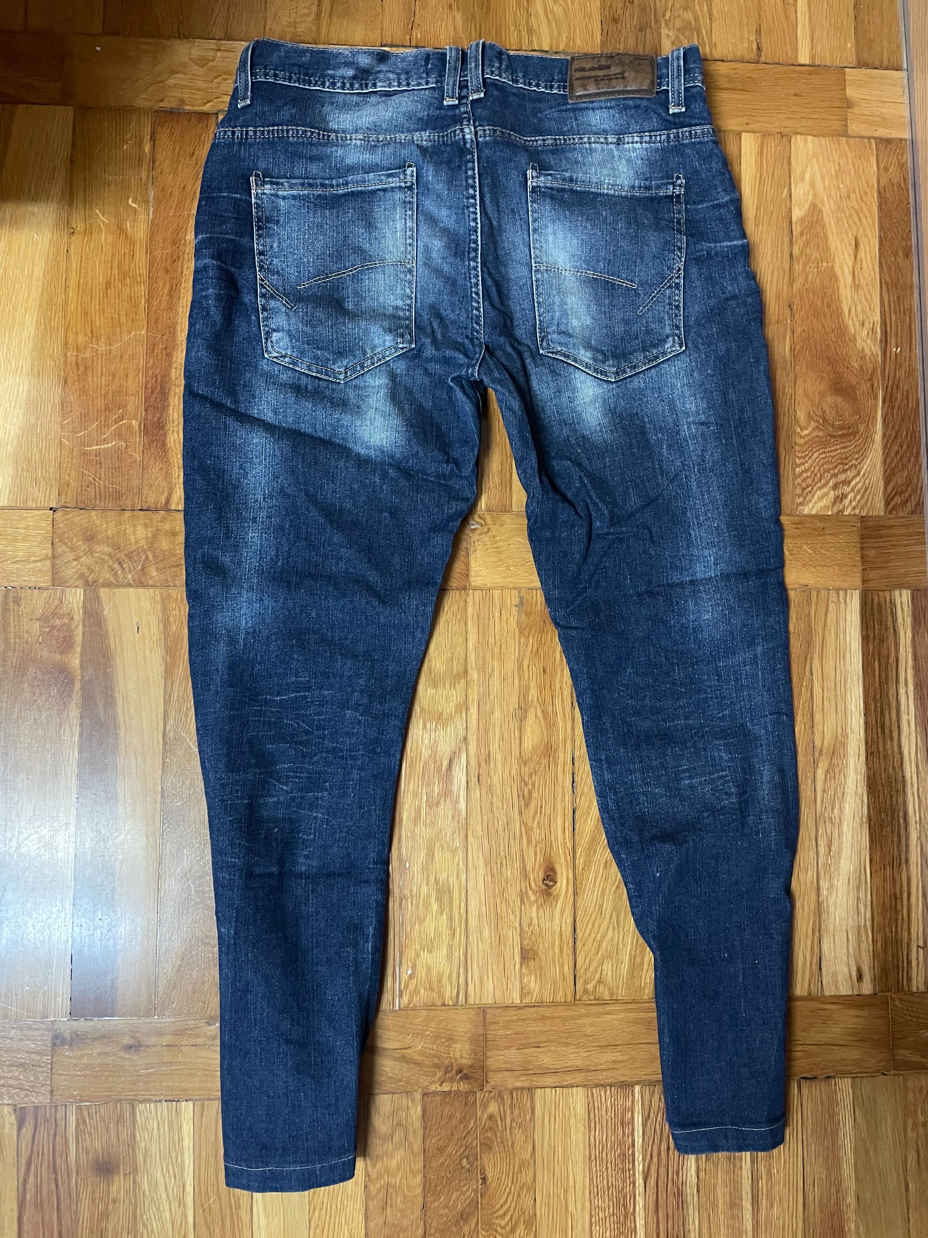 Spodnie jeansy Pull & Bear rozmiar 42 EUR / M długość 95 cm