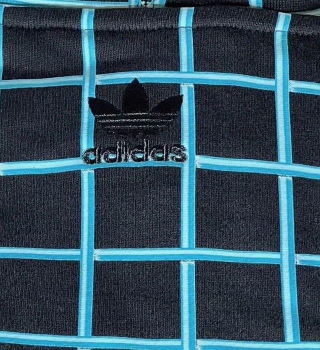 Sprzedam białą bluzę Adidas x Jeremy Scott w rozmiarze XL.
