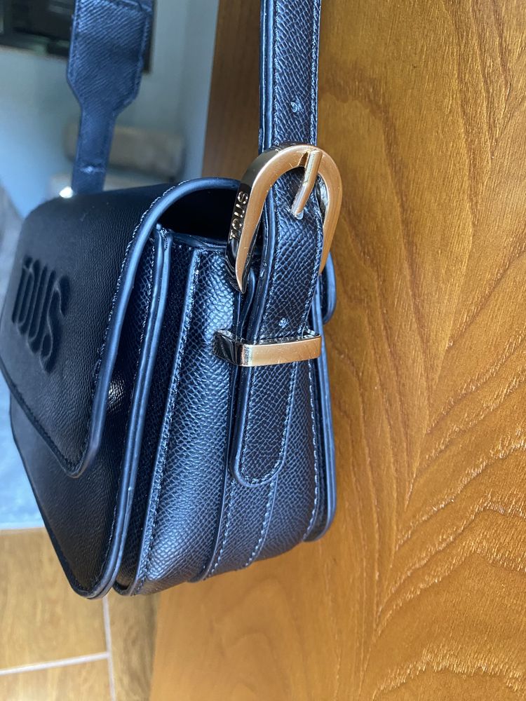 Bolsa da “Tous,”como nova