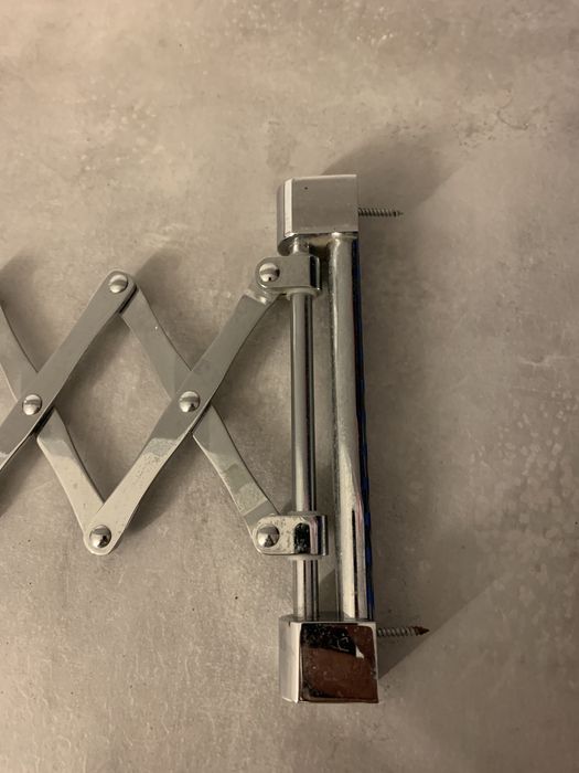 Espelho de aumento extensível