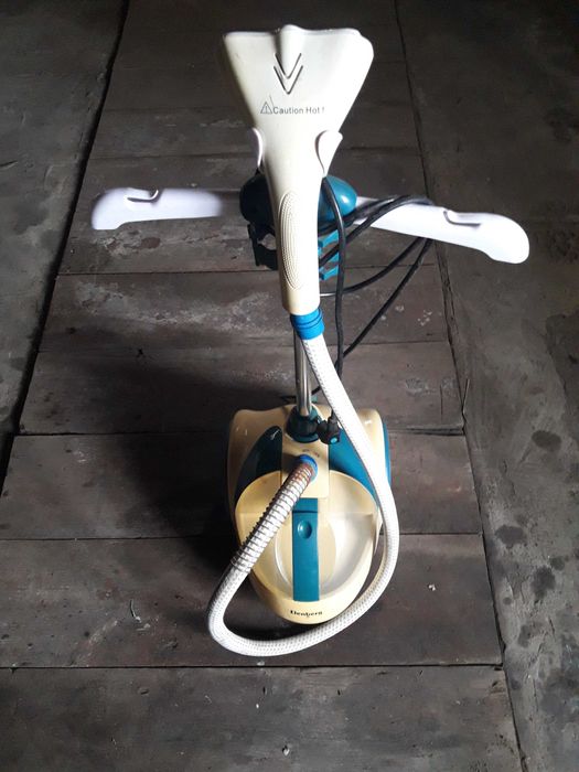 Отпариватель. Паровой утюг Elenberg.