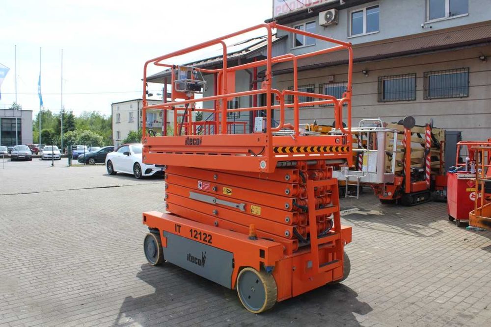 Iteco IT12122 nożycowy podnośnik zwyżka 14 m haulotte genie 4047 jlg