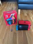 Nintendo Switch OLED + etui + LEGO city