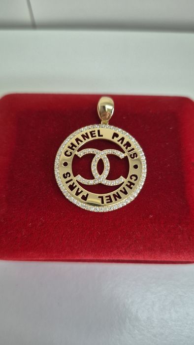 Złota zawieszka Channel,okrągła,białe cyrkonie,585