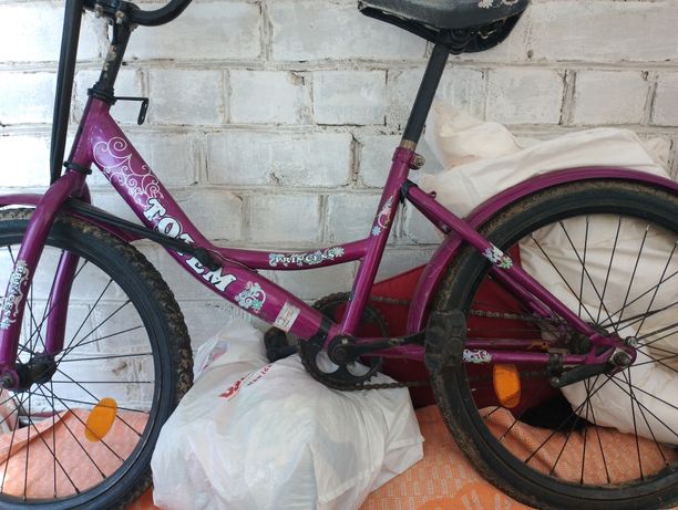Велосипед для дітей фіолетового кольору
