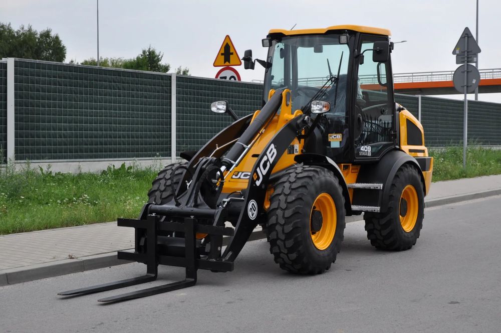 JCB WLS 409 SV FABRYCZNIE NOWA ! DOSTĘPNA OD RĘKI ! WIDŁY DO PALET SZYBKOZŁĄCZE HYDRAULICZNE