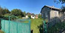 Земельна ділянка з будинком, літньою кухнею та гаражем в с. Озеряни