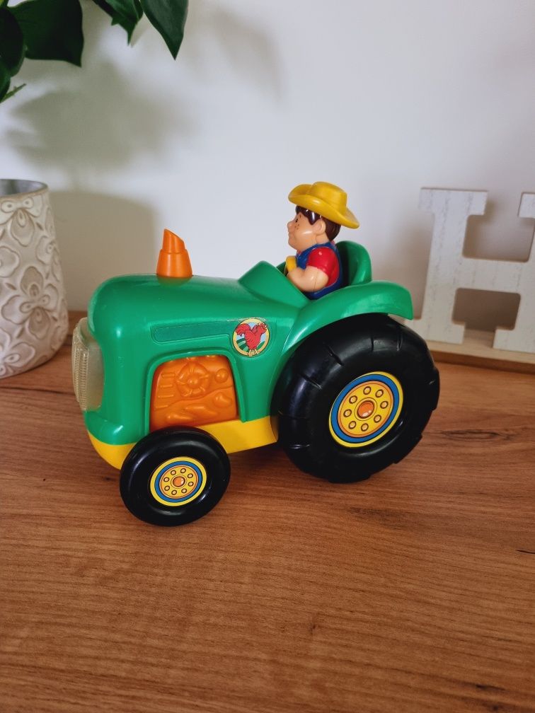 Zabawka traktor ciągnik z farmerem Dumel