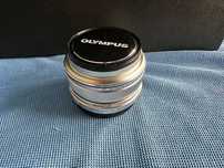 Objetiva Olympus 17 MM 1.8 - Nova com fatura de compra