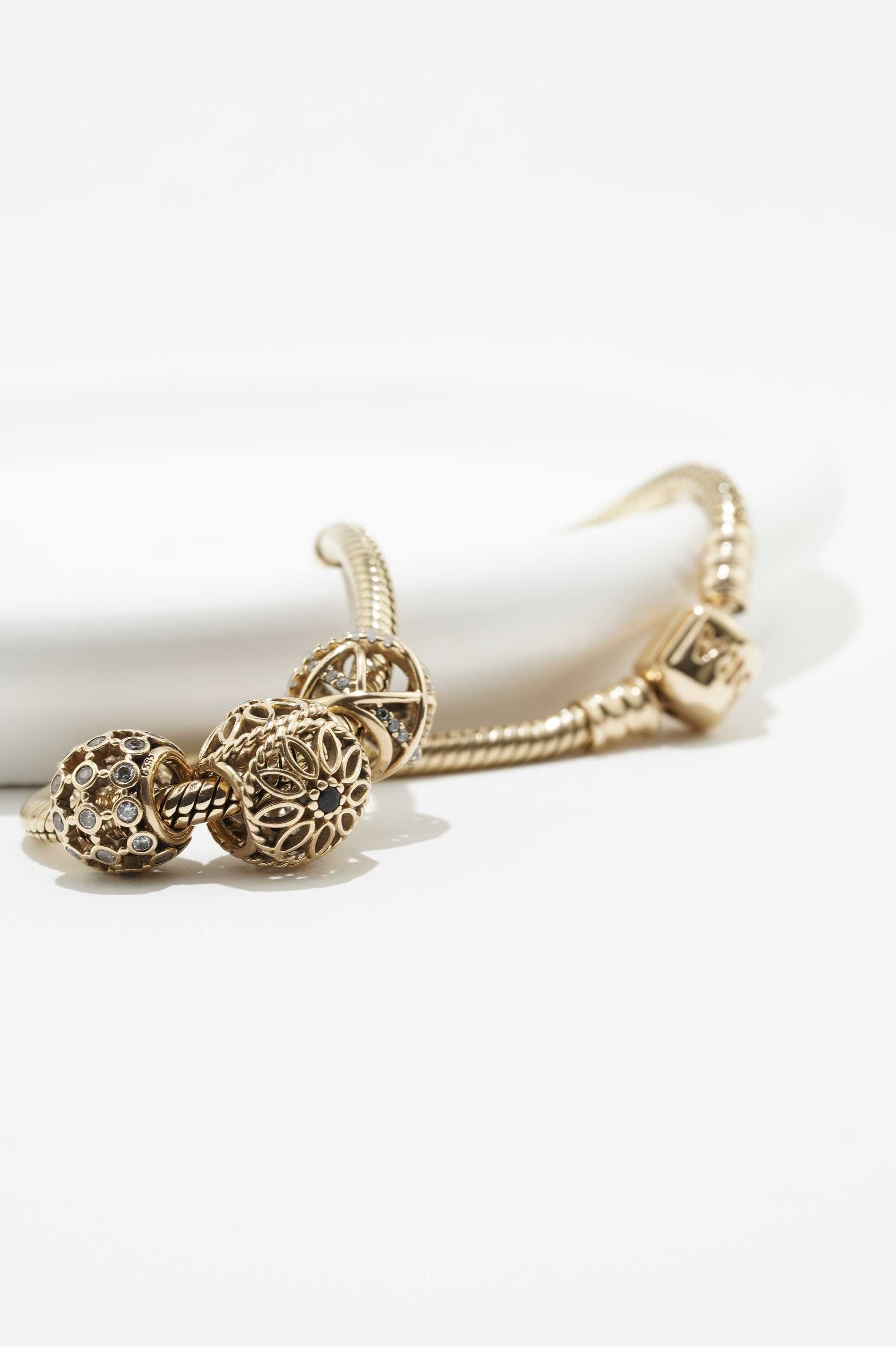 Złota bransoletka Pandora 14K 22,65g