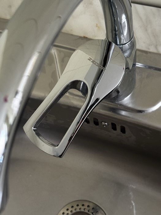 Мойка с нержавейки и кран