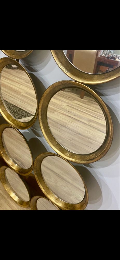 Espelho decorativo dourado