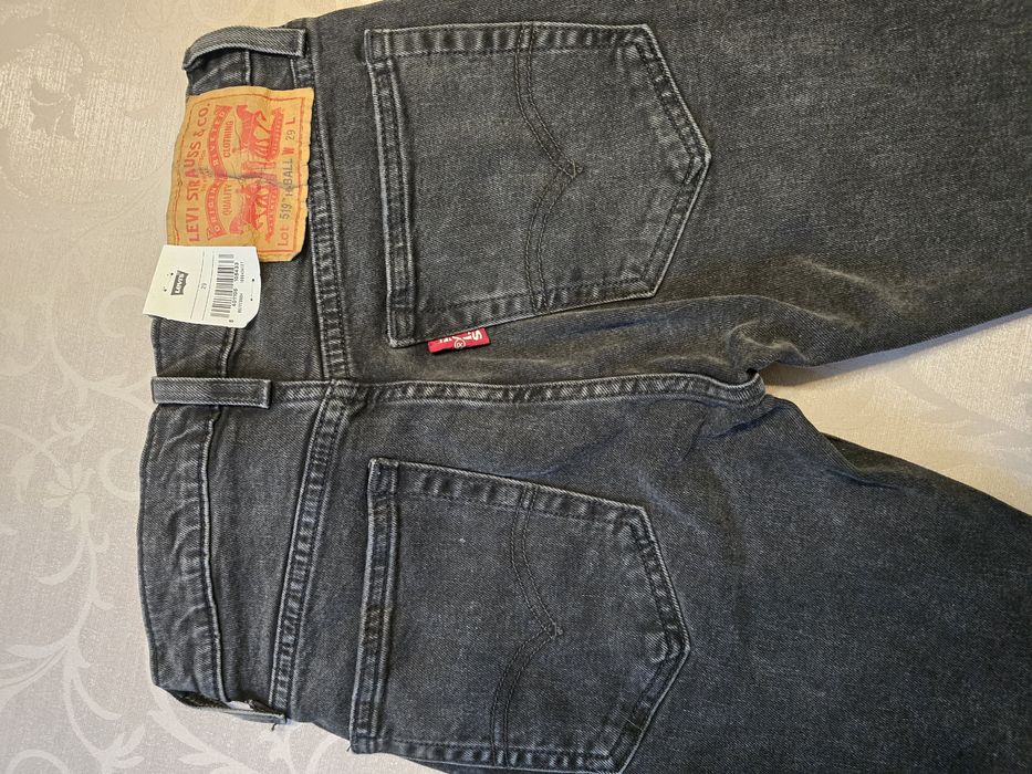 Nowe spodnie Levisy 519 unisex W29 czarne