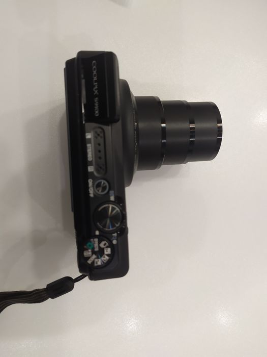 Фотоаппарат NICON COOLPIX S9100 в комплекте 64 гиг карта.