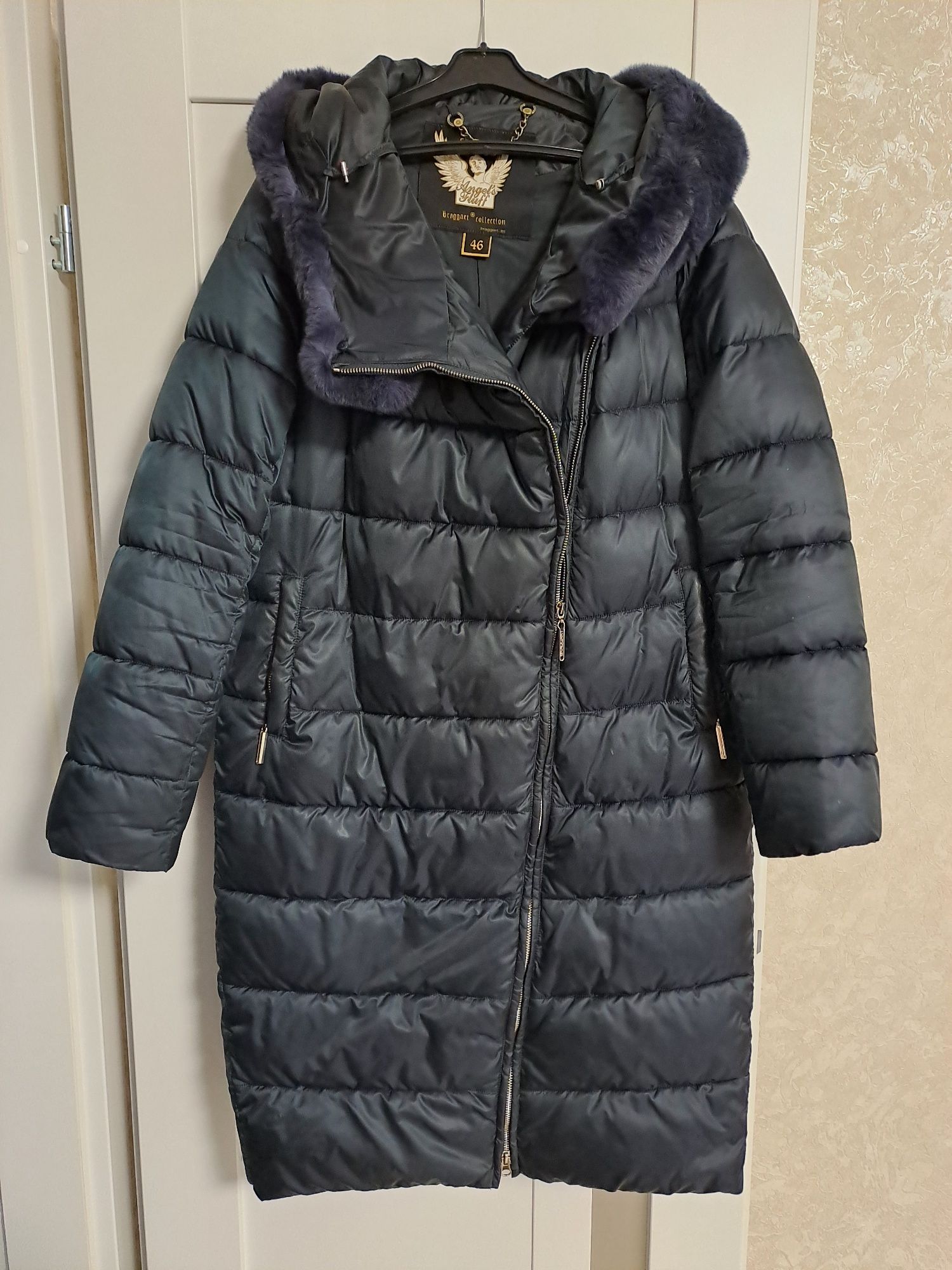 Продам женский пуховик