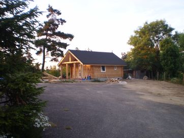Budowa domu domku letniskowego z bali w technologii Skandynawskiej.