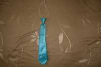 Nowy duży krawat turkusowy satynowy elegancki wizyto na gumce 8-15 l