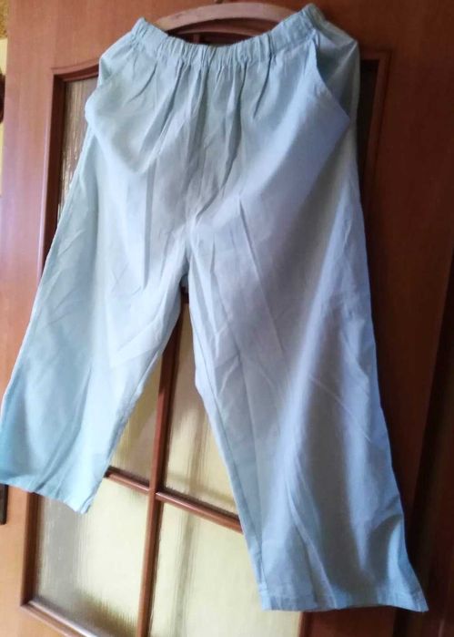 Spodnie damskie rybaczki bladoniebieskie rozm. 50