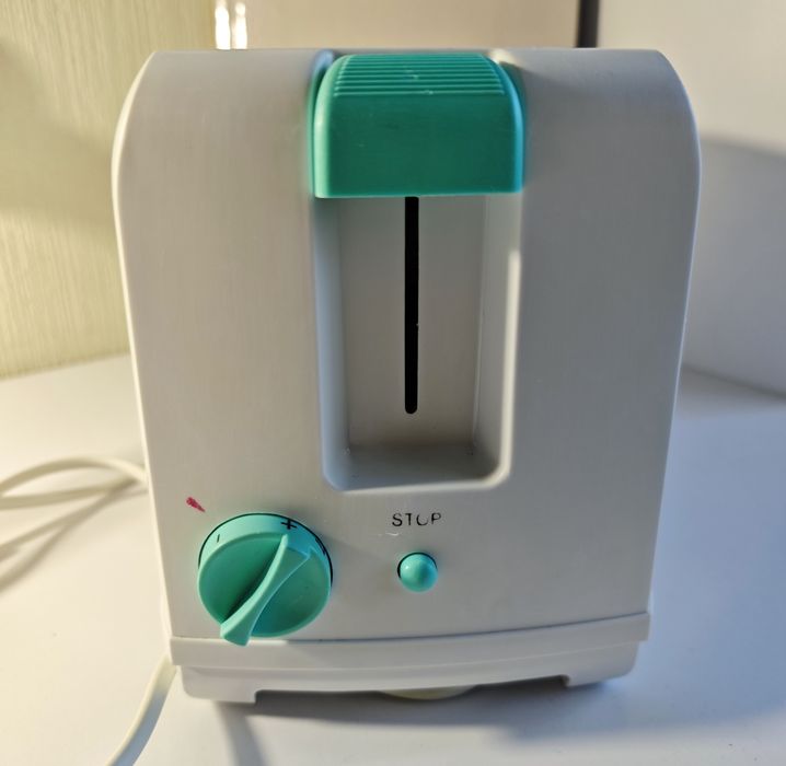 Продам тостер rising