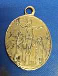 Medalha muito antiga.