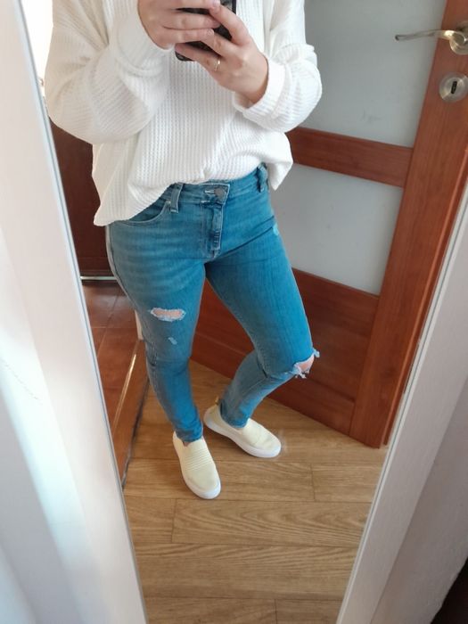 Spodnie jeansy z rozdarciami M