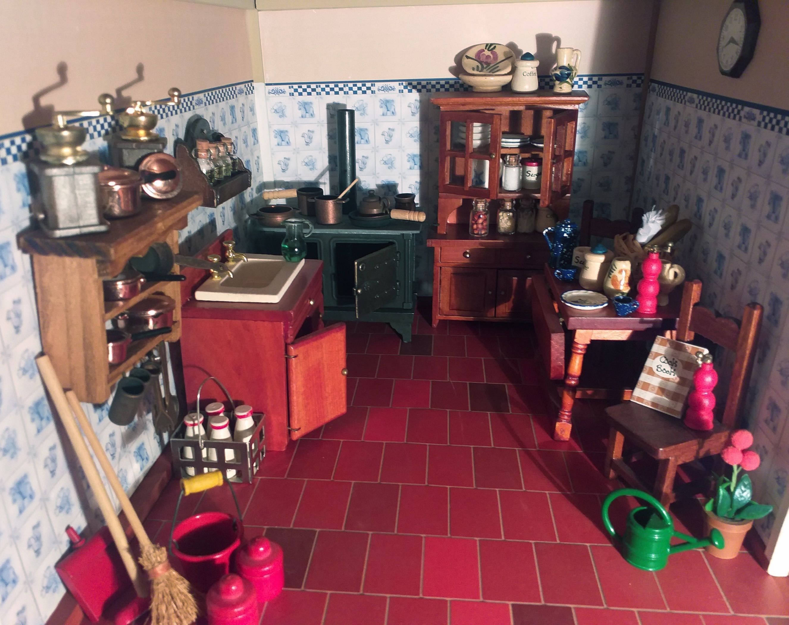 Casa de Bonecas com adereços e mobília extra.