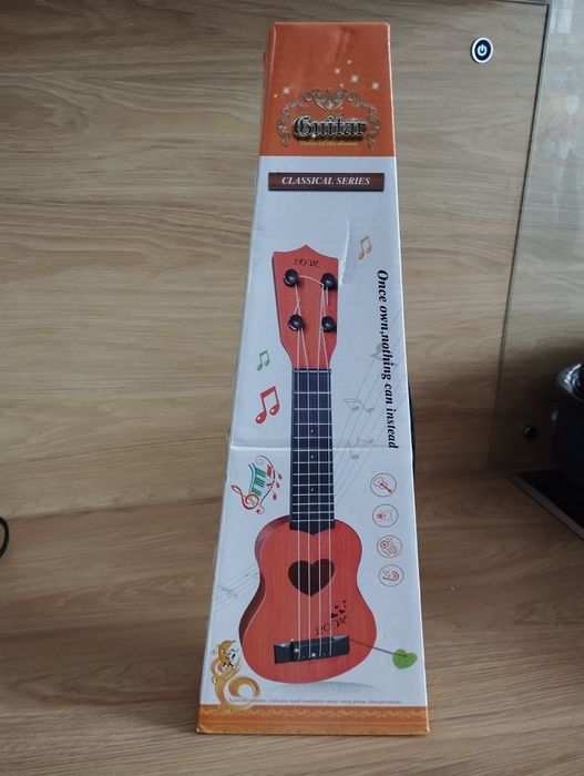 Gitara plastikowa ze strunami - Nowa