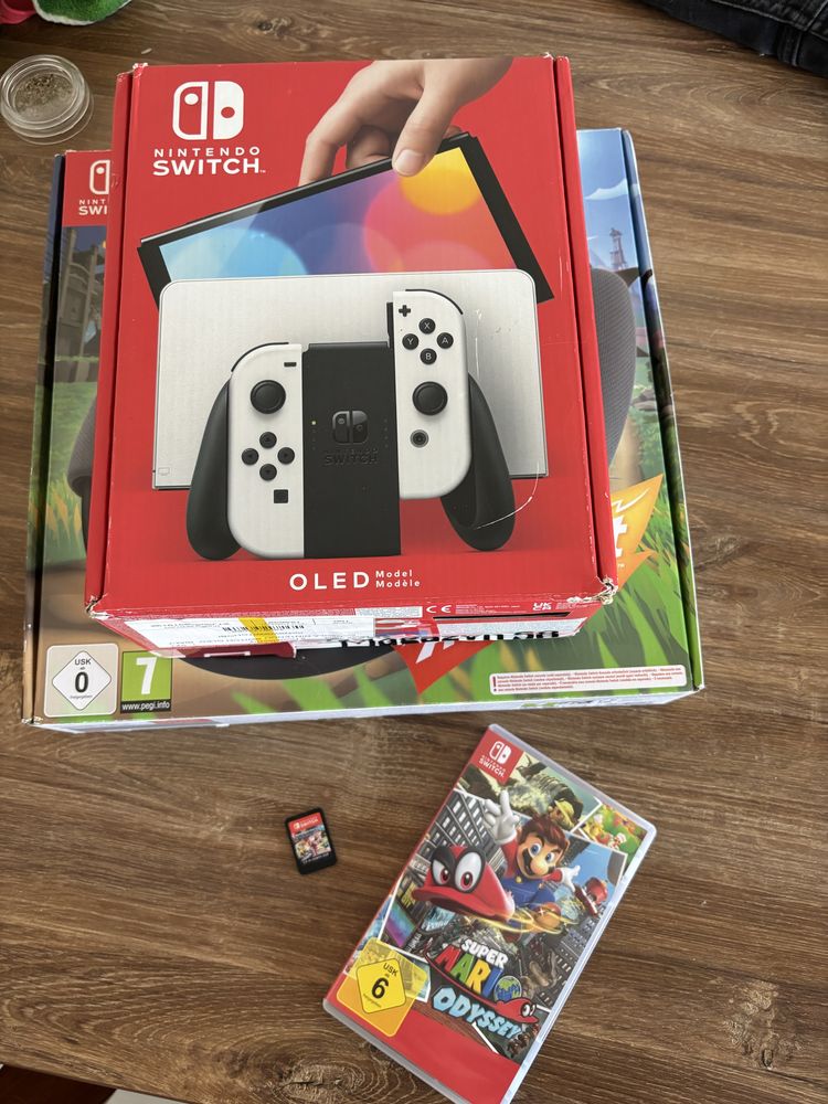 Nintedno Switch OLED + gry + Ring fit