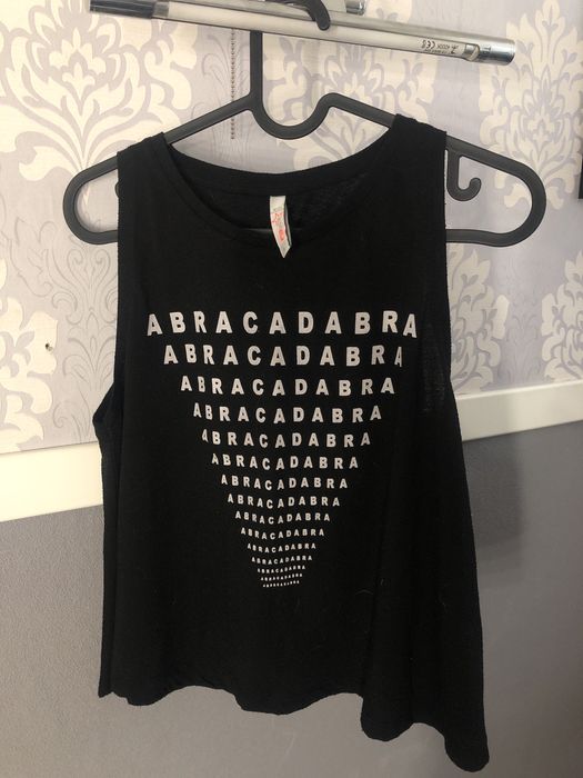 Zestaw bluzek/koszulek dla młodzieży 8szt stonowane kolory