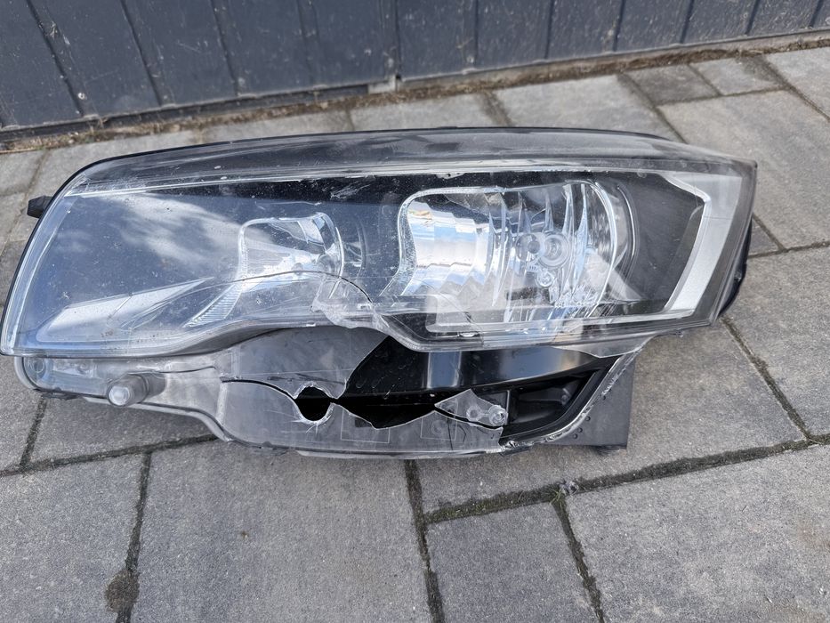 Reflektor lewy peugeot 508 lift