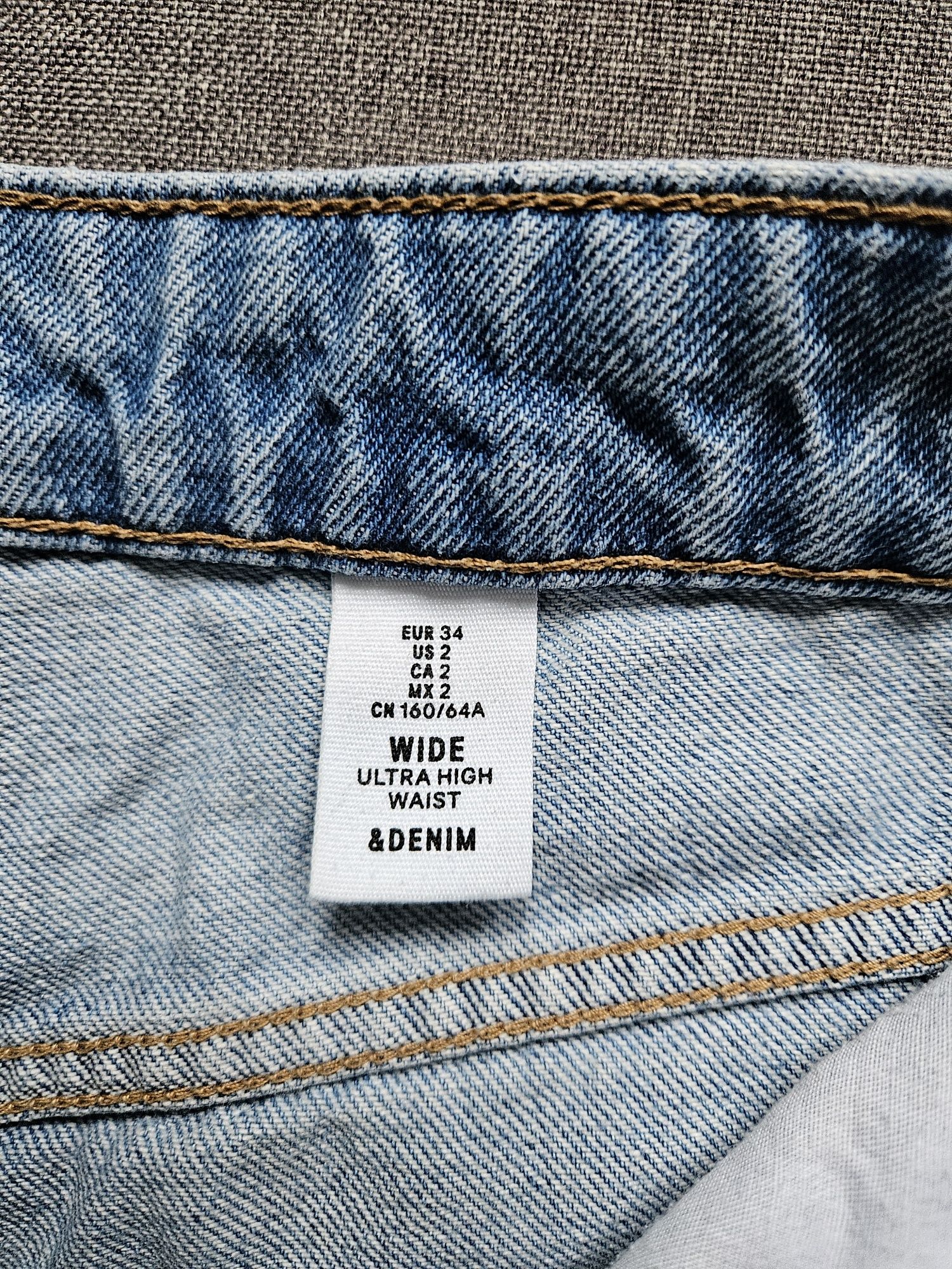 Dżinsy H&M rozm. 34 model wide z przetarciami