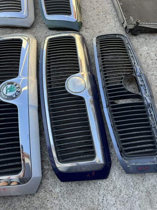 Решотка капота шкода суперб 1